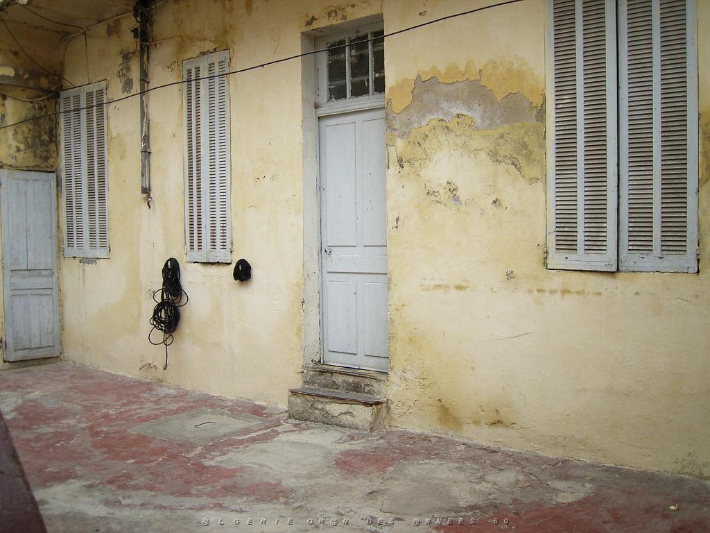 032-ORAN-Juin06-rue du 75.jpg - Unicode